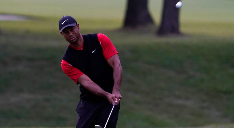 Tiger Woods of the United States watches his shot on the 11th hole during the final round of the Zozo Championship PGA Tour at the Accordia Golf Narashino country club in Inzai, east of Tokyo, Japan, Sunday, Oct. 27, 2019. Tiger Woods of the United States watches his shot on the 11th hole during the final round of the Zozo Championship PGA Tour at the Accordia Golf Narashino country club in Inzai, east of Tokyo, Japan, Sunday, Oct. 27, 2019.