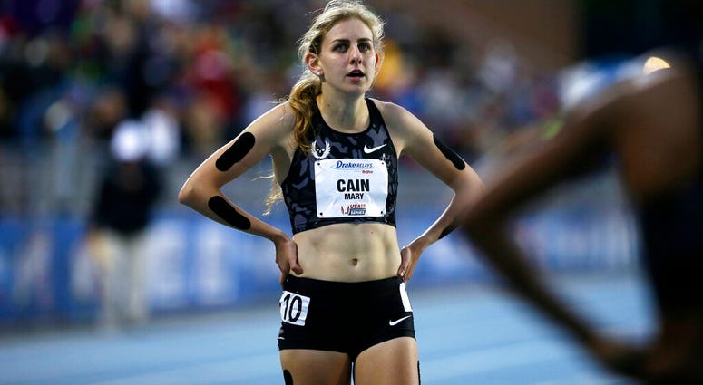 In this April 29, 2016, file photo, Mary Cain walks off the track after competing in the women's special 1500-meter run at the Drake Relays athletics meet, in Des Moines, Iowa AP DO TNO USE