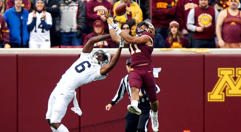 Minnesota defensive back Antoine Winfield Jr. (11) intercepts the ball intended for Penn State wide receiver Justin Shorter (6) during an NCAA college football game, Saturday, Nov. 9, 2019, in Minneapolis. Minnesota defensive back Antoine Winfield Jr. (11) intercepts the ball intended for Penn State wide receiver Justin Shorter (6) during an NCAA college football game, Saturday, Nov. 9, 2019, in Minneapolis.