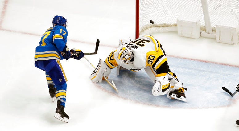 St. Louis Blues' Jaden Schwartz (17) scores past Pittsburgh Penguins goaltender Matt Murray (30) during the third period of an NHL hockey game, Saturday, Nov. 30, 2019, in St. Louis AP DO NOT USE