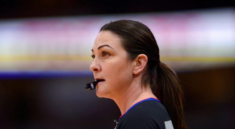 Referee Lauren Holtkamp-Sterling watches during the first half of an NBA basketball game between the Chicago Bulls and the Golden State Warriors on Friday, Dec. 6, 2019, in Chicago. This is Holtkamp-Sterling's first game back since giving birth. Referee Lauren Holtkamp-Sterling watches during the first half of an NBA basketball game between the Chicago Bulls and the Golden State Warriors on Friday, Dec. 6, 2019, in Chicago. This is Holtkamp-Sterling's first game back since giving birth.