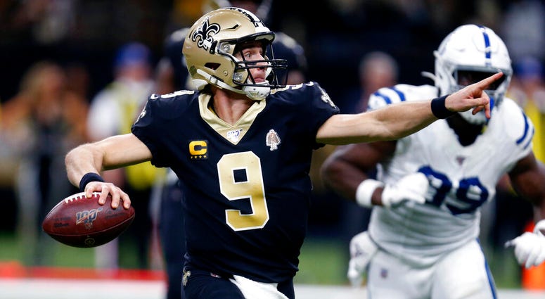 New Orleans Saints quarterback Drew Brees (9) scrambles to pass in the first half of an NFL football game against the Indianapolis Colts in New Orleans, Monday, Dec. 16, 2019. AP DO NOT USE
