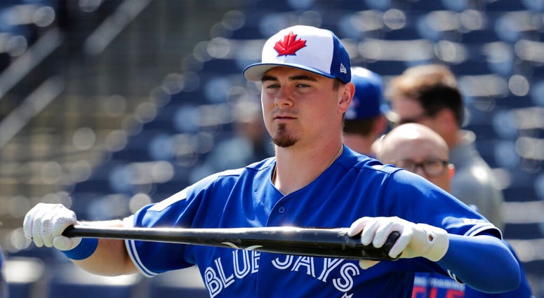 file photo, Toronto Blue Jays' Reese McGuire takes batting practice before a spring training baseball game against the New York Yankees file photo, Toronto Blue Jays' Reese McGuire takes batting practice before a spring training baseball game against the New York Yankees