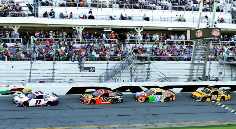 A group of Toyota's run in a single file from left, Denny Hamlin (11), Martin Truex Jr. (19), Kyle Busch (18),Erik Jones (20) and Christopher Bell (95) NASCAR Daytona 500 auto race at Daytona International Speedway, Monday, Feb. 17, 2020, in Daytona Beach