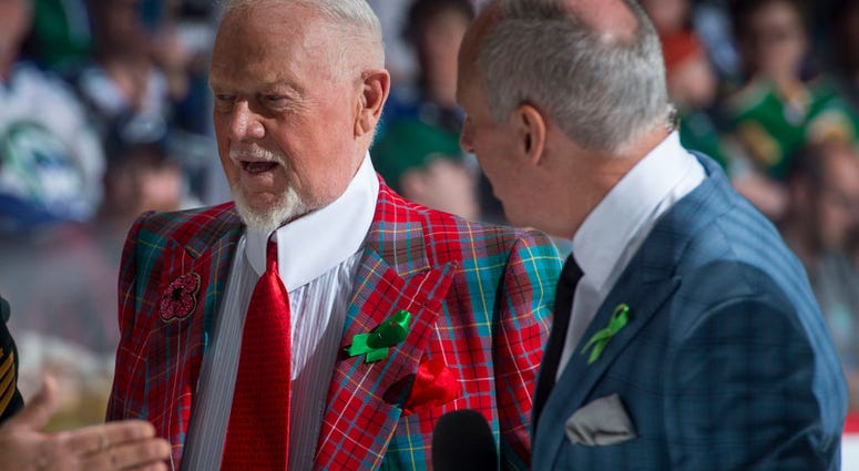 REGINA, SK - MAY 21: Don Cherry and Ron MacLean of Coaches Corner stand on the ice at the start of the game between Hamilton Bulldogs and the Swift Current Broncos at Brandt Centre - Evraz Place on May 21, 2018 in Regina, Canada.