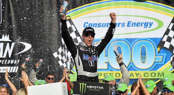 Kevin Harvick, driver of the #4 Mobil 1 Ford, celebrates in Victory Lane after winning the Monster Energy NASCAR Cup Series Consumers Energy 400 at Michigan International Speedway on August 11, 2019 in Brooklyn, Michigan. Stewart Haas Racing's Kevin Harvick Celebrates In Victory Lane At Michigan International Speedway