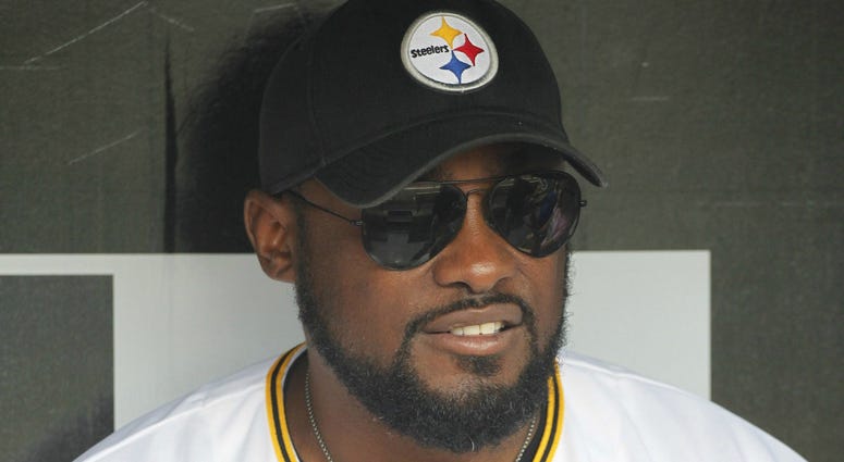 Steelers Coach Mike Tomlin wearing a Pirates jersey