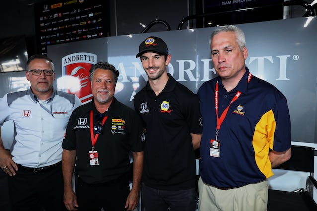 Andretti Autosport Chairman and CEO Michael Andretti and Alexander Rossi pose with executives from Honda and NAPA Auto Parts to announce the signing of Rossi to a multi-year contract. Andretti Autosport Chairman and CEO Michael Andretti and Alexander Rossi Agree To Multi-year Deal
