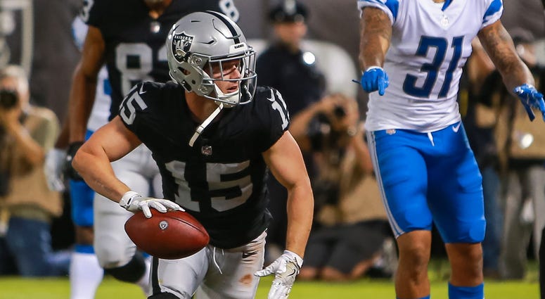 Oakland Raiders wide receiver Ryan Switzer (15) celebrates after scoring a touchdown during the second quarter against the Detroit Lions at Oakland Coliseum.