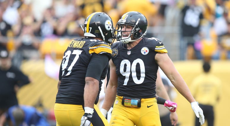 Pittsburgh Steelers defensive end Cameron Heyward (97) and outside linebacker T.J. Watt