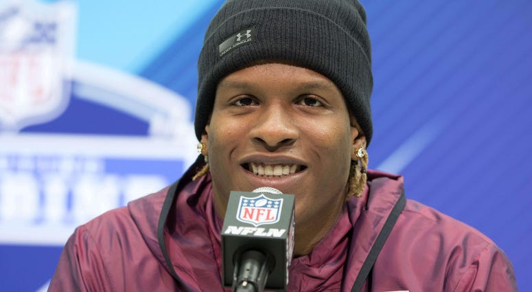 Mar 1, 2018; Indianapolis, IN, USA; West Virginia running back Justin Crawford speaks to the media