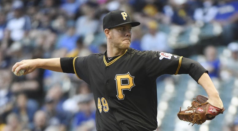 Pirates pitcher Nick Kingham throws against the Brewers Nick Kingham