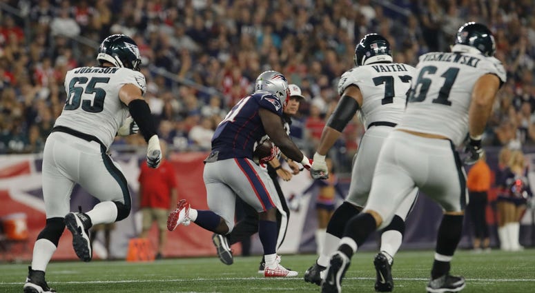 ; New England Patriots linebacker Ja'Whaun Bentley (51) recovers the ball and runs for a touchdown after the ball is stripped from Philadelphia Eagles quarterback Nick Foles DO NOT USE