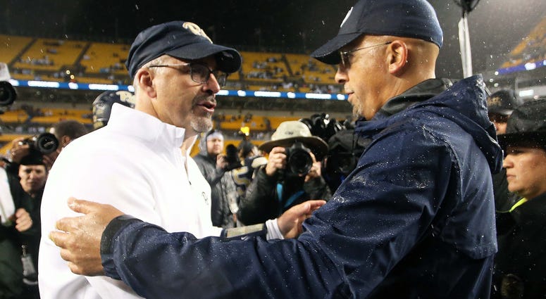 Pitt coach Pat Narduzzi and Penn State Coach James Franklin meet after Saturday's game