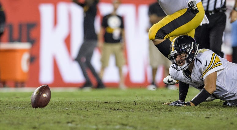 Pittsburgh Steelers quarterback Ben Roethlisberger (7) fumbles the ball during the second half against the Tampa Bay Buccaneers