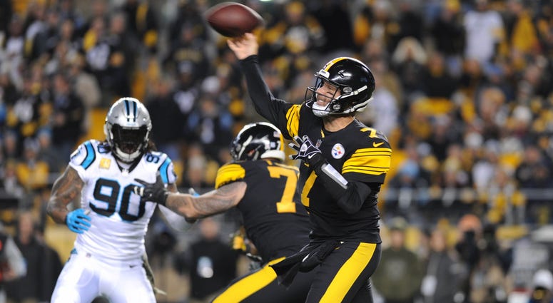 Pittsburgh, PA, USA; Pittsburgh Steelers quarterback Ben Roethlisberger (7) throws a first quarter touchdown against the Carolina Panthers