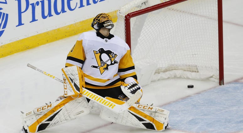 Pittsburgh Penguins goaltender Casey DeSmith (1) reacts after a goal scored by New Jersey Devils left wing Taylor Hall