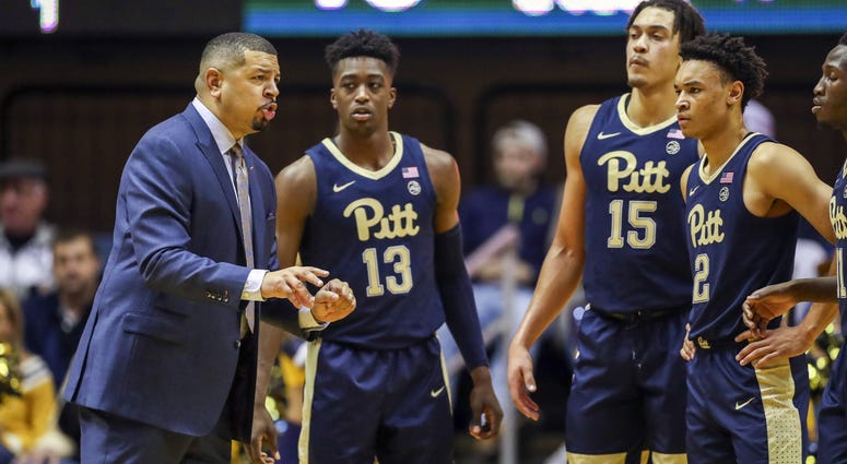 Jeff Capel & Pitt players Jeff Capel & Pitt players