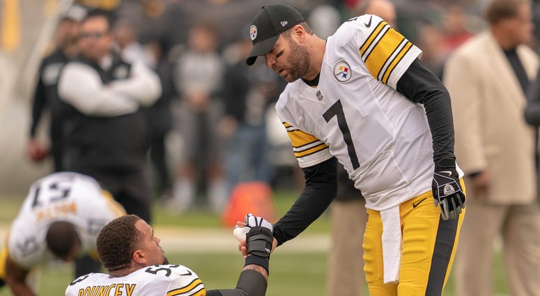 Pittsburgh Steelers quarterback Ben Roethlisberger (7) and center Maurkice Pouncey (53) before the start of the game against the Oakland Raiders at Oakland Coliseum.