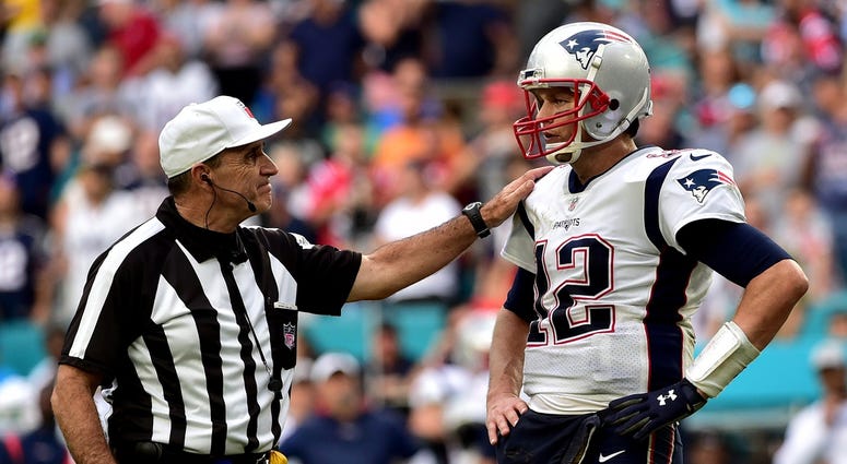 Tom Brady (right) talks with referee Pete Morelli (left) during the second half against the Miami Dolphins Tom Brady (right) talks with referee Pete Morelli (left) during the second half against the Miami Dolphins