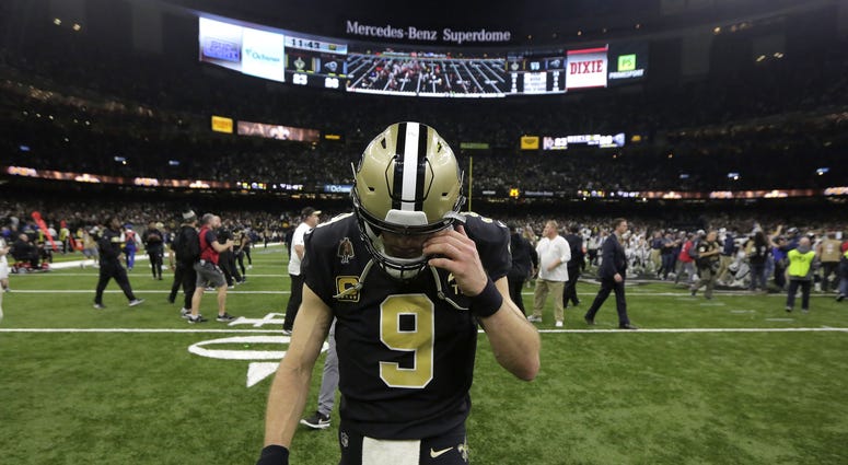 New Orleans, LA, USA; New Orleans Saints quarterback Drew Brees (9) leaves the field after losing to the Los Angeles Rams in the NFC Championship game New Orleans, LA, USA; New Orleans Saints quarterback Drew Brees (9) leaves the field after losing to the Los Angeles Rams in the NFC Championship game