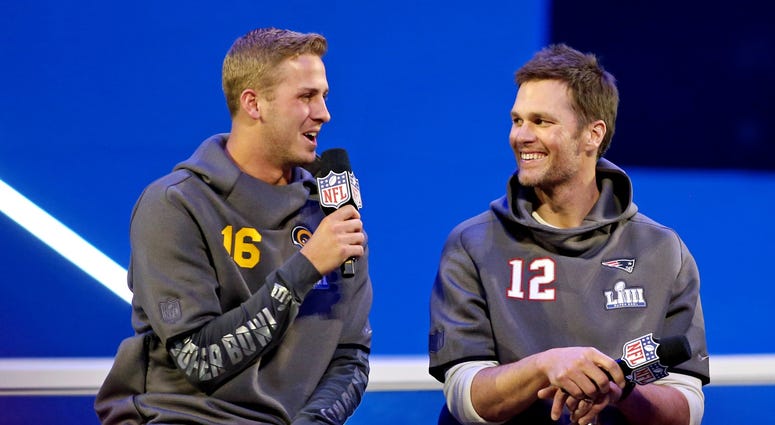 Los Angeles Rams quarterback Jared Goff (16) and New England Patriots quarterback Tom Brady Los Angeles Rams quarterback Jared Goff (16) and New England Patriots quarterback Tom Bradu