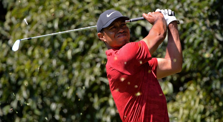 Tiger Woods plays his shot from the second tee during the final round of the WGC - Mexico Championship golf tournament at Club de Golf Chapultepec. Tiger Woods plays his shot from the second tee during the final round of the WGC - Mexico Championship golf tournament at Club de Golf Chapultepec.
