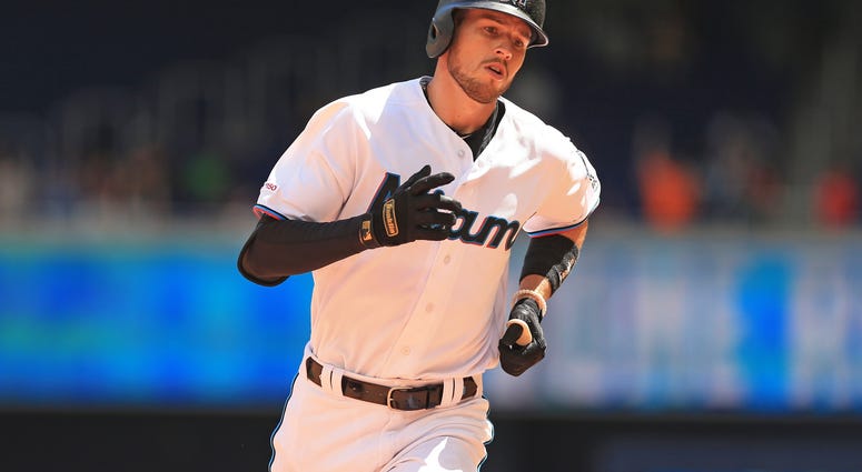 Miami Marlins shortstop JT Riddle (10) runs the bases after hitting a solo home run