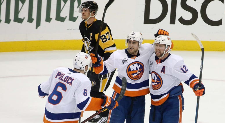 Islanders celebrate after goal vs. Penguins in Game 4 Islanders celebrate after goal vs. Penguins in Game 4