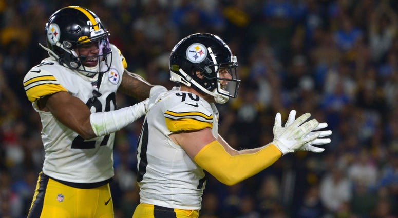 Oct 13, 2019; Carson, CA, USA; Pittsburgh Steelers outside linebacker T.J. Watt (90) and defensive back Kam Kelly