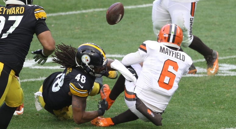 Pittsburgh Steelers outside linebacker Bud Dupree (48) forces Cleveland Browns quarterback Baker Mayfield to fumble during the third quarter at Heinz Field. Pittsburgh Steelers outside linebacker Bud Dupree (48) forces Cleveland Browns quarterback Baker Mayfield to fumble during the third quarter at Heinz Field.