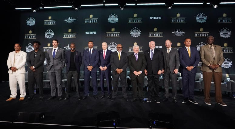 Feb 1, 2020; Miami, Florida, USA; Members of the 2020 Pro Football Hall of Fame Class pose during the NFL Honors awards presentation