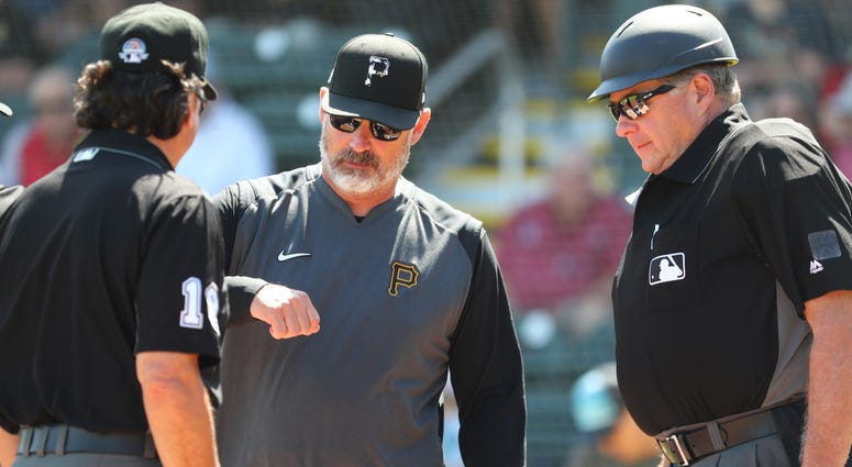 Derek Shelton with umpires