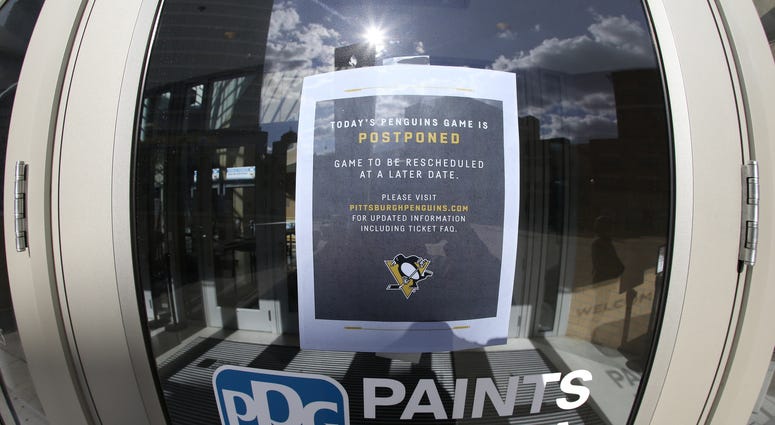 ; General exterior view of signage at the PPG PAINTS Arena as the NHL game scheduled between the Pittsburgh Penguins and the New York Islanders was suspended due to COVID-19 coronavirus concerns.