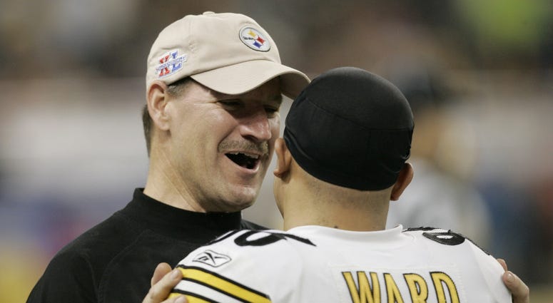 Pittsburgh Steelers head Bill Cowher talks to Super Bowl MVP Hines Ward during Super Bowl XL at Ford Field