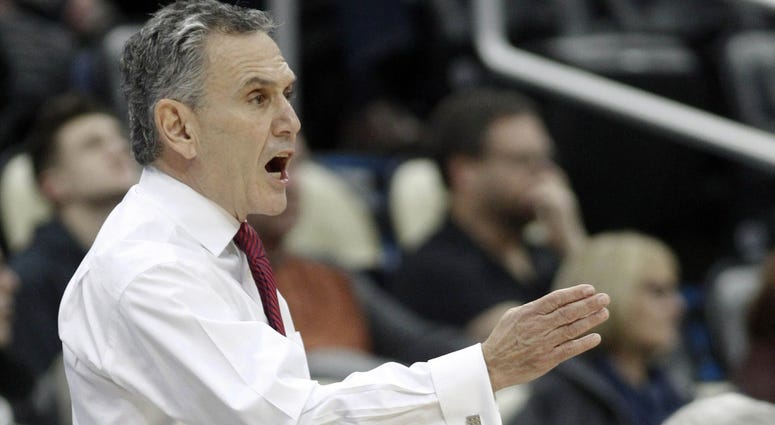 Duquesne Dukes head coach Keith Dambrot gestures on the sidelines against the Pittsburgh Panthers during the first half at PPG Paints Arena. Pittsburgh won 74-53.