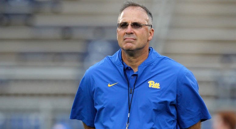 Pittsburgh Panthers head coach Pat Narduzzi stands on the field during a warm up practice prior to the game against the Penn State Nittany Lions at Beaver Stadium.