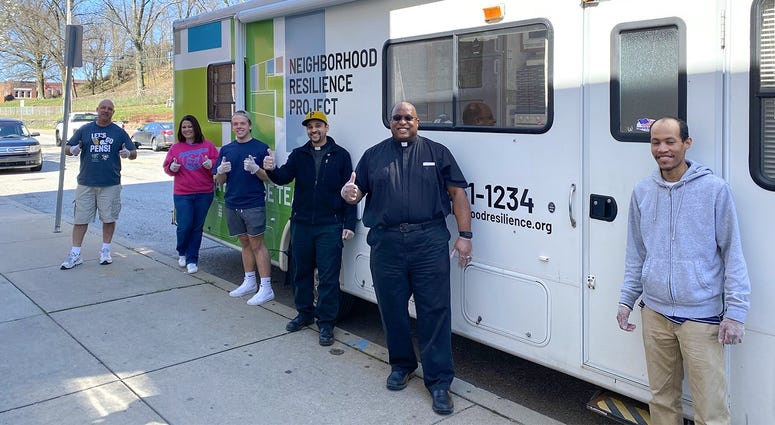Penguins deliver pizza to community centers