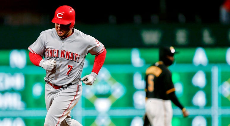 Cincinnati Reds' Eugenio Suarez, Pittsburgh Pirates' Josh Harrison Cincinnati Reds' Eugenio Suarez, Pittsburgh Pirates' Josh Harrison