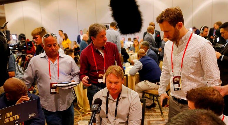Oakland Raiders head coach Jon Gruden speaks to the media during the NFC/AFC coaches breakfast during the annual NFL football owners meetings, Tuesday, March 26, 2019, in Phoenix. DO NOT USE