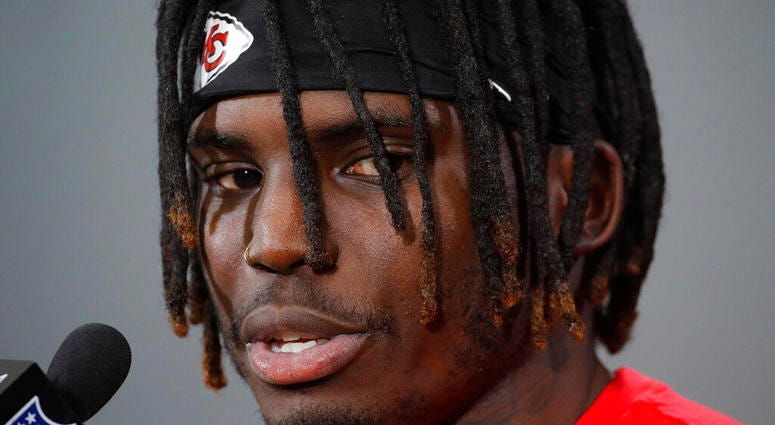 In this Jan. 18, 2019, file photo, Kansas City Chiefs wide receiver Tyreek Hill talks to the media after a workout in Kansas City, Mo. The Kansas City Chiefs have made a habit of inciting controversy during the NFL draft AP DO NOT USE