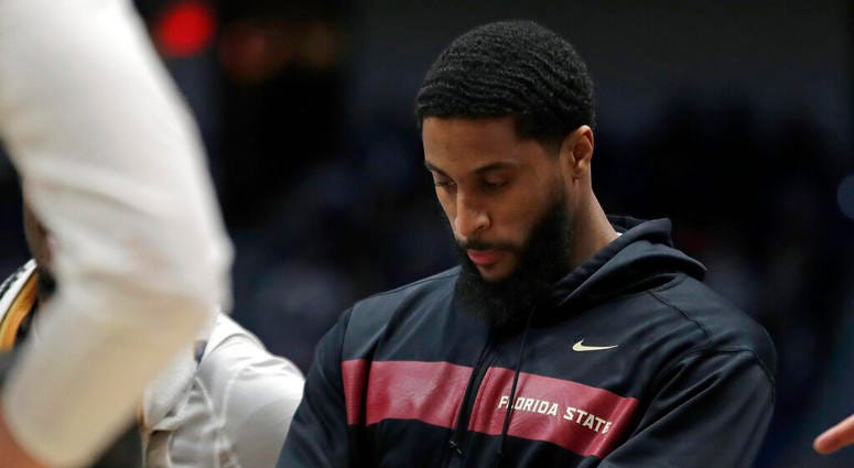 Florida State's Phil Cofer watches during a team huddle in the second half of a second round men's college basketball game against Murray State in the NCAA Tournament, Saturday, March 23, 2019, in Hartford, Conn. Florida State won 90-62 Florida State's Phil Cofer watches during a team huddle in the second half of a second round men's college basketball game against Murray State in the NCAA Tournament, Saturday, March 23, 2019, in Hartford, Conn. Florida State won 90-62