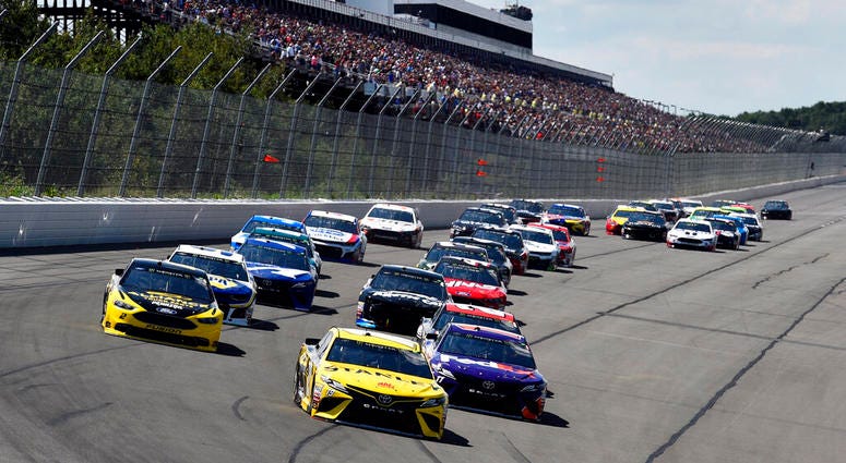 Daniel Suarez (19) leads the field into Turn 1 to start a NASCAR Cup Series auto race Daniel Suarez (19) leads the field into Turn 1 to start a NASCAR Cup Series auto race