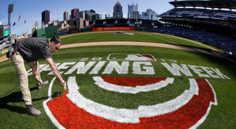 Andy Burnette, of the PNC Ground Crew paints, the Opening Week logo on the field at PNC Park Wednesday, March 27, 2019 in preparation for the Pittsburgh Pirates home-opener on Monday, April 1, against the St. Louis Cardinals Andy Burnette, of the PNC Ground Crew paints, the Opening Week logo on the field at PNC Park Wednesday, March 27, 2019 in preparation for the Pittsburgh Pirates home-opener on Monday, April 1, against the St. Louis Cardinals