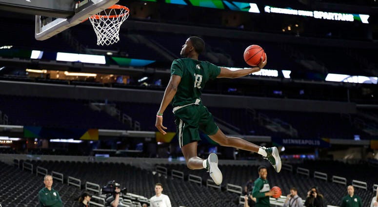 Michigan State forward Gabe Brown dunks the ball during a practice session for the semifinals of the Final Four NCAA college basketball tournament, Friday, April 5, 2019, in Minneapolis. Michigan State forward Gabe Brown dunks the ball during a practice session for the semifinals of the Final Four NCAA college basketball tournament, Friday, April 5, 2019, in Minneapolis.