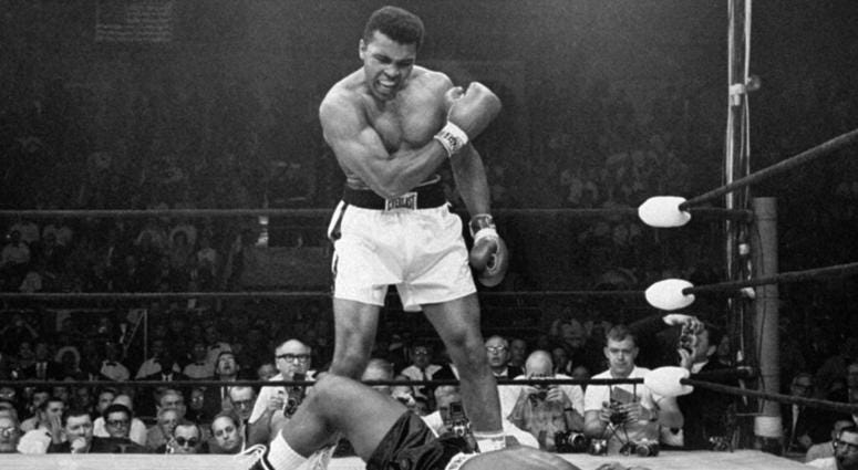 heavyweight champion Muhammad Ali stands over fallen challenger Sonny Liston AP DO NOT USE