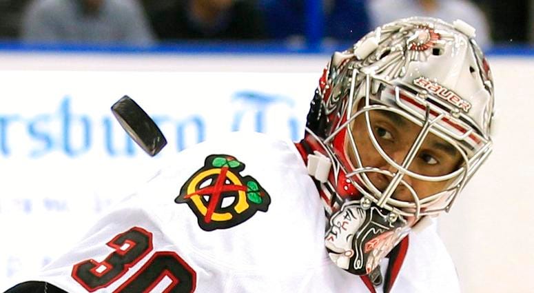 Chicago Blackhawks goalie Ray Emery keeps his eyes on a shot by the Tampa Bay Lightning during the second period of an NHL hockey game in Tampa DO NOT USE