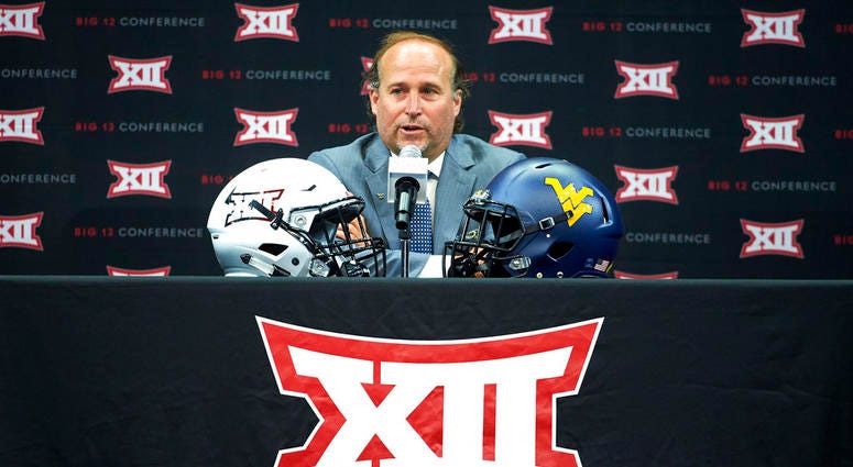 est Virginia head coach Dana Holgorsen speaks during the NCAA college football Big 12 media days in Frisco, Texas, Tuesday, July 17, 2018. DO NOT USE