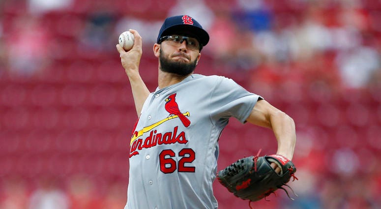 St. Louis Cardinals starting pitcher Daniel Poncedeleon (62) throws against the Cincinnati Reds during the first inning of a baseball game, Monday, July 23, 2018, in Cincinnati. DO NOT USE