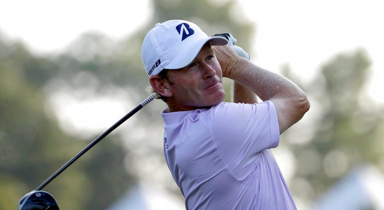 Brandt Snedeker watches his tee shot on the 11th hole during the first round of the Wyndham Championship golf tournament in Greensboro, N.C., Thursday, Aug. 16, 2018. DO NOT USE